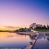 australia stock photography | Queen Elizabeth Terrace, Lake Burley Griffin and High Court of Australia in the Morning, Canberra, ACT, Australia. Queen Elizabeth Terrace is the name of the road along the main foreshore of Lake Burley Griffin. Originally part of Parkes Place, this stretch of waterfront was renamed in 2012, with The Prince of Wales and the Duchess of Cornwall officially opening the road in honour of Her Majesty's Diamond Jubilee celebrations. Queen Elizabeth Terrace is a meeting place, an exercise route, a children's scooter-riding path and a social hub of the Parliamentary Triangle. It should be the first stop for any tourists visiting the city to take in the views and enjoy this lakeside, peaceful setting. It is also a handy location to start exploring the many museums and attractions nearby. Although a short stretch of road, Queen Elizabeth Terrace has a number of attractions located within it for visitors to enjoy.