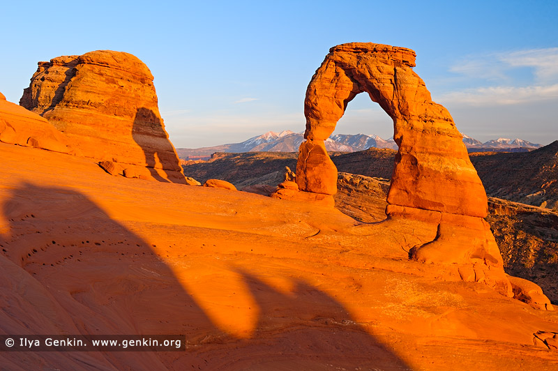 portfolio stock photography | Delicate Arch at Sunset with background of La Sal Mountains, Arches National Park, Utah, USA, Image ID AMERICAN-SOUTHWEST-0005