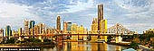 australia stock photography | The Story Bridge and Brisbane at Sunrise, Brisbane, QLD, Australia, Image ID AU-BRISBANE-0004. Panorama of the Story Bridge and Brisbane City from Wilsons Outlook Reserve at sunrise. Like the Sydney Harbour Bridge in Sydney, the Story Bridge is one of Brisbane's most prominent icons. When the Story Bridge was officially opened on July 6, 1940, an impressive crowd of 37,000 people gathered to witness the ribbon cutting ceremony. This heritage-listed cantilever bridge connects Kangaroo Point, Fortitude Valley and Brisbane CBD. It is used by more than 30 million cars every year as well as cyclists and pedestrians commuting to and from work. The bridge is also a popular destination for tourists to enjoy uninterrupted 360 degree views of our river city.