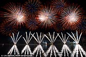 australia stock photography | Skyfire 2018 Firework Display over Lake Burley Griffin, Canberra, Australian Capital Territory (ACT), Australia, Image ID AU-CANBERRA-FIREWORKS-SKYFIRE-0002. Skyfire is an annual March fireworks show held over Lake Burley Griffin in Canberra, Australia since 1989. The event is funded by local radio station FM 104.7, and the display is synchronised to a soundtrack of music broadcast on the station. Skyfire 2018 delivered a magnificent display of fireworks as part of The Enlighten Festival. It's Canberra's biggest night of fireworks - and this year the event turns 30. The fireworks display was 18 minutes of extravagant lights and explosions timed to hits provided by 104.7 including some classics from across the 30 years of Skyfire events.