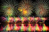 australia stock photography | Skyfire 2018 Firework Display over Lake Burley Griffin, Canberra, Australian Capital Territory (ACT), Australia, Image ID AU-CANBERRA-FIREWORKS-SKYFIRE-0005. Skyfire is an annual March fireworks show held over Lake Burley Griffin in Canberra, Australia since 1989. The event is funded by local radio station FM 104.7, and the display is synchronised to a soundtrack of music broadcast on the station. Skyfire 2018 delivered a magnificent display of fireworks as part of The Enlighten Festival. It's Canberra's biggest night of fireworks - and this year the event turns 30. The fireworks display was 18 minutes of extravagant lights and explosions timed to hits provided by 104.7 including some classics from across the 30 years of Skyfire events.