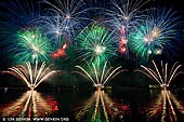 australia stock photography | Skyfire 2018 Firework Display over Lake Burley Griffin, Canberra, Australian Capital Territory (ACT), Australia, Image ID AU-CANBERRA-FIREWORKS-SKYFIRE-0004. Skyfire is an annual March fireworks show held over Lake Burley Griffin in Canberra, Australia since 1989. The event is funded by local radio station FM 104.7, and the display is synchronised to a soundtrack of music broadcast on the station. Skyfire 2018 delivered a magnificent display of fireworks as part of The Enlighten Festival. It's Canberra's biggest night of fireworks - and this year the event turns 30. The fireworks display was 18 minutes of extravagant lights and explosions timed to hits provided by 104.7 including some classics from across the 30 years of Skyfire events.