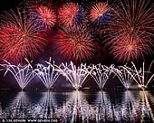 australia stock photography | Skyfire 2018 Firework Display over Lake Burley Griffin, Canberra, Australian Capital Territory (ACT), Australia, Image ID AU-CANBERRA-FIREWORKS-SKYFIRE-0006. Skyfire is an annual March fireworks show held over Lake Burley Griffin in Canberra, Australia since 1989. The event is funded by local radio station FM 104.7, and the display is synchronised to a soundtrack of music broadcast on the station. Skyfire 2018 delivered a magnificent display of fireworks as part of The Enlighten Festival. It's Canberra's biggest night of fireworks - and this year the event turns 30. The fireworks display was 18 minutes of extravagant lights and explosions timed to hits provided by 104.7 including some classics from across the 30 years of Skyfire events.