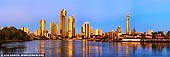 australia stock photography | Surfers Paradise at Sunset, Gold Coast, QLD, Australia, Image ID AU-GOLD-COAST-SURFERS-PARADISE-0012. Panoramic image of Surfers Paradise skyline and Nerang River at Sunset. I took this shot of the skyline just as the sun was starting to set. The colours were so nice - buildings were still highlighted in yellow and gold while the sky started turning blue.