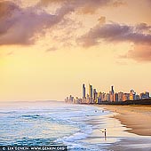australia stock photography | Surfers Paradise at Sunrise, Gold Coast, QLD, Australia, Image ID AU-GOLD-COAST-SURFERS-PARADISE-0013. View of the Gold Coast from Southport Spit sand pumping jetty at sunrise. The Southport Spit (also referred to as The Spit) lies opposite of Southport to the north of Main Beach, Gold Coast. It is a permanent sand spit that separates the Southport Broadwater from the Pacific Ocean. On the end of The Spit is the Gold Coast Sand Pumping Jetty, a popular destination for fishermen and part of the Gold Coast Seaway's Sand Bypassing System.