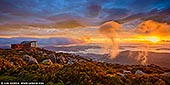 australia stock photography | Beautiful Sunrise Over Hobart From Mount Wellington Lookout, Tasmania (TAS), Australia, Image ID AU-HOBART-0006. Mt Wellington peaks at 1270m, towering above Hobart, Tasmania like a benevolent overlord. The citizens find reassurance in its constant, solid presence, while outdoors types find the space to hike and bike on its leafy flanks. And the view from the top is unbelievable! Don't be deterred if the sky is overcast - often the peak rises above cloud level and looks out over a magic carpet of cotton-topped clouds. At sunrises or sunsets when the clouds are above Mt Wellington, like on the photo, the view is just breathtaking!