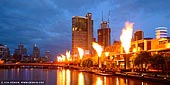australia stock photography | Fire Show at Crown Casino, South Bank, Melbourne, VIC, Australia, Image ID AU-MELBOURNE-0003. The Gas Brigades, also called Fireballs, is a show on the banks of the Yarra River outside the Crown Casino on the South Bank, Melbourne, VIC, Australia. Computer controlled fireballs are released from eight ten meters high towers at night time. The Fire display timing at the Casino Melbourne display occurs every hour right on the hour from Monday to Friday starting at 9:00 pm till Midnight. On Saturday and Sunday the fire display starts from 8:00 pm till Midnight. (Please note that the Gas Brigade operation is subject to weather conditions on the day and during summer time if there is a Total Fire Ban declarations, the show will not take place. Display times are subject to seasonal changes).