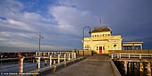 australia stock photography | St Kilda Pavilion at Sunrise, Melbourne, VIC, Australia, Image ID AU-MELBOURNE-0005. The St Kilda Pavilion is a historic kiosk located at the end of St Kilda Pier, in St Kilda, Victoria, Australia. The kiosk was designed by James Charles Morell and built in 1904 by John W. Douglas. The kiosk was proposed and operated by Francis Parer. Until the 1930s the structure was widely known as Parer's Pavilion however its actual name was the Austral Refreshment Rooms. In the 1930s it was renamed Kerby's Kiosk. The Kerby family were involved with running the kiosk from 1934 through to 1987. Noble and Ivy Kerby acquired the lease from the Victorian Government in 1939. The Pavilion is listed on the Victorian Heritage Register.