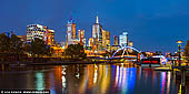 australia stock photography | Melbourne, Rainbow Pedestrian Bridge and Flinders Street Station at Night, Southbank, Melbourne, Victoria, Australia, Image ID AU-MELBOURNE-0033. Southbank is Melbourne's premier culture destination. In Southbank, you will find the National Gallery of Victoria, Melbourne Recital Centre, Arts Centre Melbourne, the Australian Centre for Contemporary Art, and more. It's also home to some of the city's finest restaurants, and the mecca that is Crown Melbourne.