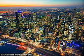 australia stock photography | Melbourne City at Night from Eureka Tower, Melbourne, Victoria, Australia, Image ID AU-MELBOURNE-0036. Eureka Skydeck 88 has awe inspiring views of Melbourne from the highest public vantage point in the Southern Hemisphere. Situated in the heart of Southbank in the iconic Eureka Tower, the Skydeck stands at a staggering 297 metres above the streets of Melbourne. Both locals and visitors regard the Skydeck as one of the best things to do in Melbourne. Visitors are invited to come and explore the urban sprawl, humming neighbourhoods and Melbourne Tourist attractions and landmarks by day; and dazzling city lights at night. Enjoying birds eye views of the iconic MCG and sporting precinct, Port Phillip Bay, Albert Park Lake and out as far as the Dandenong Ranges should be on every visitor's list of Melbourne Things to do. Melbourne's notoriously unpredictable weather provides an ever-changing lens through which to enjoy the spanning panorama of the city- no two days are the same from the Skydeck.