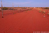australia stock photography | Dingo Fence at Twilight, Cameron Corner, NSW/QLD/SA, Australia, Image ID CAMERON-CORNER-NSW-QLD-SA-0001. 