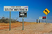 australia stock photography | Road Signs at Cameron Corner, Cameron Corner, NSW/QLD/SA, Australia, Image ID CAMERON-CORNER-NSW-QLD-SA-0009. 