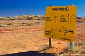 australia stock photography | Warning Sign at White Cliffs Opal Mines, White Cliffs, NSW, Australia, Image ID WHITE-CLIFFS-OPAL-MINES-0001. 