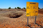 australia stock photography | Warning Sign at White Cliffs Opal Mines, White Cliffs, NSW, Australia, Image ID WHITE-CLIFFS-OPAL-MINES-0005. 
