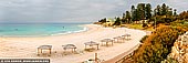 australia stock photography | Cottesloe Beach, Perth, WA, Australia, Image ID AU-PERTH-0003. Cottesloe Beach is one of Perth's most popular spots for swimming, snorkelling and surfing. Like all Perth beaches, Cottesloe Beach has clean white sand and beautiful clear turquoise water, but what makes it stand out from the crowd are the grassed terraces and park behind the beach, the tall shady Norfolk Island pine trees and the fun and lively atmosphere in summer when it seems everyone in Perth wants to be down at Cottesloe Beach!