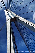 australia stock photography | Anzac Bridge Pylon, Glebe, Sydney, NSW, Australia, Image ID AU-SYDNEY-ANZAC-BRIDGE-0003. Anzac Bridge in Sydney, Australia has a main span of 345 metres, and a total length of more than 800 metres. From two 120-metre-high towers, 128 stay cables support the reinforced concrete deck. It is the longest cable-stayed span bridge in Australia and among the longest concrete cable-stayed span bridges in the world.