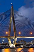 australia stock photography | Anzac Bridge and Sydney Harbour Bridge at Night, Glebe, Sydney, NSW, Australia, Image ID AU-SYDNEY-ANZAC-BRIDGE-0005. From the shore of the Rozelle Bay in Glebe visitors, tourists and locals can see both Anzac Bridge and Sydney Harbour Bridge in the distance.