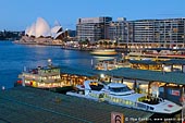 australia stock photography | Ferries at Circular Quay, Sydney, New South Wales (NSW), Australia, Image ID AU-SYDNEY-CIRCULAR-QUAY-0007. Stock photograph of the ferries at the Circular Quay in Sydney with the Sydney Opera House highlighted in the background.