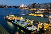australia stock photography | Circular Quay and Sydney Opera House, Sydney, New South Wales (NSW), Australia, Image ID AU-SYDNEY-CIRCULAR-QUAY-0003. Ferries are waiting for passengers at the Circular Quay wharf in Sydney, Australia while Sydney Opera House highlighted in the background.