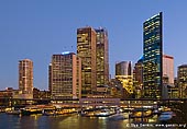 australia stock photography | Circular Quay from Overseas Passenger Terminal, Sydney, New South Wales (NSW), Australia, Image ID AU-SYDNEY-CIRCULAR-QUAY-0004. Close up picture of Circular Quay ferry terminals and Sydney city as the background after sunset.