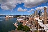 australia stock photography | Circular Quay and The Rocks from Harbour Bridge, Sydney, New South Wales (NSW), Australia, Image ID AU-SYDNEY-CIRCULAR-QUAY-0011. Walking across Sydney Harbour Bridge is free and tourists can enjoy the scenery of the Sydney Harbour, The Opera House, The Circular Quay and The Rocks from above. The view from the bridge is spectacular and on a clear day, you will be snapping loads of photos, so don't forget to bring your camera.