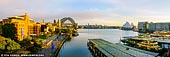 australia stock photography | Circular Quay at Sunrise, Sydney, New South Wales (NSW), Australia, Image ID AU-SYDNEY-CIRCULAR-QUAY-0017. The birthplace of both the city and the modern nation, this compact area seamlessly combines the historic with the exuberantly modern. Circular Quay is situated around Sydney Cove, once a shipping region, but now a transport, leisure and recreational centre. It is made up of walkways, parks and restaurants and hosts a number of ferry quays and a train station. There are a couple of art galleries on Circular Quay, The Museum of Contemporary Art in an art deco building, and the grand looking Customs House. Circular Quay is also home to one of Australia's most famous icons the Sydney Opera House. On the east side of Circular Quay are its many restaurants and stylish boutiques, along with the large Dendy Cinema. On the western side of Circular Quay is the famous Rocks area with a number of quaint shopping arcades and pretty restaurants. Circular QuayMacquarie Place can be found along several narrow lanes leading from Circular Quay to the centre. A number of historic points can be found here, including a cannon and anchor from the HMS Sirius, the first fleet ship, and an Obelisk which states various distances.