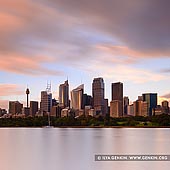 australia stock photography | The Sydney City CBD at Sunrise, Sydney, NSW, Australia, Image ID AU-SYDNEY-0012. Beautiful photo of the Sydney city skyline at sunrise as it was seen on a stormy morning from the shore of Farm Cove in the Royal Botanic Gardens near Mrs Macquarie's Chair in Sydney, NSW, Australia.