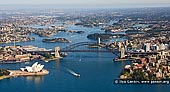 australia stock photography | Aerial View of Sydney City , Sydney, NSW, Australia, Image ID AU-SYDNEY-0011. High altitude aerial photo image of the Sydney Harbour from the air, showing the Sydney Opera House, the Sydney CBD, Circular Quay, the Bridge, the Parramatta River, North Sydney, and Kirribilli.