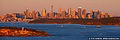 australia stock photography | Sydney City at Sunrise, North Head, Sydney, NSW, Australia, Image ID AU-SYDNEY-0019. North Head Lookout allows you to enjoy magnificent views across Sydney Harbour, back towards Manly Cove and south, towards South Head. The view is especially beautiful at sunrise when the city is highlighted in red and yellow. North Head is also a great spot to enjoy the famous Sydney fireworks on New Years Eve. Far from the hectic city crowds, North Head is a fantastic place to count down the new year in style. It is also one of the best places in Sydney to view the whales from the land.