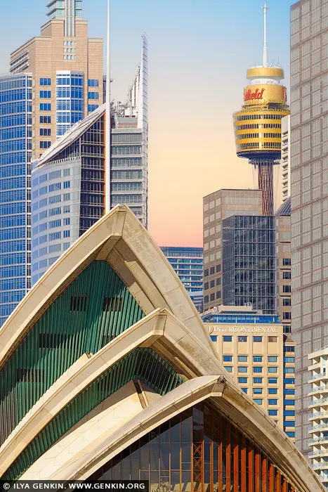 australia stock photography | Pastel Morning Harmony in Sydney, Sydney, New South Wales (NSW), Australia. As dawn breaks over Sydney, a soft pastel sky bathes the city in ethereal light, casting a serene glow across the architectural icons of Australia. The sculptural sails of the Sydney Opera House rise gracefully in the foreground, their organic curves contrasting beautifully against the sleek vertical lines of the city's modern skyline. Behind them, the golden hues of Sydney Tower and surrounding skyscrapers shimmer with quiet elegance, creating a composition that blends cultural legacy with urban vitality. This artwork captures a rare stillness in the heart of a bustling metropolis - a moment of calm and clarity. Perfect for bringing a sense of modern sophistication and tranquil energy into any living space or creative studio.