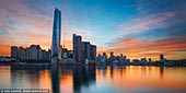 australia stock photography | Vivid Sunrise at Crown Casino, Barangaroo and Darling Harbour, Sydney, New South Wales, Australia, Image ID AU-SYDNEY-BARANGAROO-0006. Crown Towers Sydney is so-called 'six star' hotel with the claim it is Australia's 'most luxurious'. The hotel forms part of Crown Sydney's $2.2 billion Barangaroo complex, with several restaurants, bars and luxury retail outlets also opening with the hotel. At 275 metres high, Crown Towers is the tallest hotel in Sydney, with 349 guest rooms including 22 luxury 'villas'. There are 14 restaurants and bars on site, along with a spa and pool. There's also a free observation deck open to the public, 250 metres up. The 88-storey building was designed by Britain's Chris Wilkinson, whose firm Wilkinson Eyre was also responsible for Singapore's iconic Gardens by the Bay.