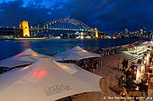 australia stock photography | Dinning at Opera Bar With Harbour Bridge View, Sydney, New South Wales (NSW), Australia, Image ID AU-SYDNEY-HARBOUR-BRIDGE-0010. The Opera Bar is located on the lower concourse at the Sydney Opera House in Sydney, NSW, Australia. It is an incredible location that offers the most amazing views of the Opera House, Harbour Bridge and the city. The views here are stunning, not only the Opera House, and the water, but the whole city skyline leaps up above you, not to mention the bridge in all her glittering glory.