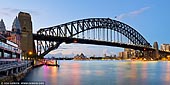 australia stock photography | Panoramic Image of Harbour Bridge and Sydney Opera House, Milsons Point, Sydney, NSW, Australia, Image ID AU-SYDNEY-HARBOUR-BRIDGE-0041. Panoramic photograph of the Harbour Bridge and the Sydney Opera House from Luna Park in Milsons Point, Sydney, NSW, Australia right before sunrise. Usually this location is a perfect spot for sunset photography, but morning shots can be quite attractive too.