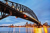 australia stock photography | Sunrise at Harbour Bridge and Sydney Opera House, Milsons Point, Sydney, NSW, Australia, Image ID AU-SYDNEY-HARBOUR-BRIDGE-0049. Calm blue dawn in Sydney, NSW, Australia near the Harbour Bridge and the Sydney Opera House.