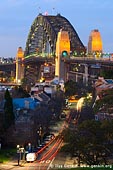 australia stock photography | Sydney Harbour Bridge from Observatory Hill, Sydney, New South Wales (NSW), Australia, Image ID AU-SYDNEY-HARBOUR-BRIDGE-0002. Observatory Hill Park is located in the centre of Sydney, NSW, Australia and it is a popular attraction for locals, workers and tourists boasting one of the City's best terrestrial vantage points for superb panoramic views of Sydney Harbour and the Harbour Bridge. Watching sunset is especially magnificent from that vantage point. Access to Observatory Hill is from Argyle Street in The Rocks.