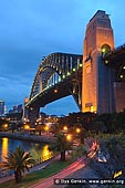 australia stock photography | Sydney Harbour Bridge at Night, Sydney, New South Wales (NSW), Australia, Image ID AU-SYDNEY-HARBOUR-BRIDGE-0014. The Sydney Harbour Bridge is one of Australia's most well known and photographed landmarks. It is the world's largest (but not the longest) steel arch bridge with the top of the bridge standing 134 metres above the harbour. Fondly known by the locals as the 'Coathanger', the Sydney Harbour Bridge celebrates its 80th birthday in 2012, with its official opening in March 1932.