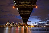 australia stock photography | Under The Harbour Bridge at Night, Sydney, New South Wales (NSW), Australia, Image ID AU-SYDNEY-HARBOUR-BRIDGE-0027. Stunning night photo of the Sydney Harbour Bridge and Sydney city at night, made from Milsons Point in Sydney, New South Wales, Australia.