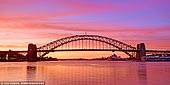 australia stock photography | Sydney Harbour Bridge at Sunrise, A View from Blues Point Reserve, Sydney, New South Wales (NSW), Australia, Image ID AU-SYDNEY-HARBOUR-BRIDGE-0040. Amazing panoramic image of the Sydney Harbour Bridge and Sydney Opera House right before sunrise as it was seen from the Blues Point Reserve in North Sydney, NSW, Australia. The sky was in all hues from red, purple, orange and yellow turning the entire scene into magical place.