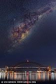 australia stock photography | Sydney Harbour Bridge and Opera House with Milky Way Rising Above, A View from Blues Point Reserve, Sydney, New South Wales (NSW), Australia, Image ID AU-SYDNEY-HARBOUR-BRIDGE-0052. Milky Way rising above Sydney Harbour Bridge and Opera House in Sydney, NSW, Australia.