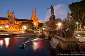 australia stock photography | Archibald Fountain at Night, Hyde Park, Sydney, NSW, Australia, Image ID AU-SYDNEY-HYDE-PARK-0003. Stock image of the Archibald Fountain in the Hyde Park in Sydney, Australia at night with St Mary's Cathedral in the background.