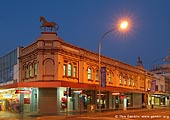 australia stock photography | Bendigo Bank Building at Bicentennial Square (Centenary Square), Parramatta, Sydney, NSW, Australia, Image ID AU-SYDNEY-PARRAMATTA-0003. The old building at Corner Church and Macquarie Streets, Parramatta, Sydney, NSW, Australia was built in 1881. This building has had a number of tenants and right now is serving as a branch of the Bendigo Bank. The sculptured horses make an interesting relief to the building which is generally pleasing to the eye.