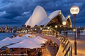 australia stock photography | Friday Evening at Sydney Opera House, Sydney, NSW, Australia, Image ID AU-SYDNEY-OPERA-HOUSE-0004. Opera Bar near the Sydney Opera House offers one of the most amazing views of the Sydney Opera House, Harbour Bridge and the city. It is a very popular place among Sydney visitors, tourists and locals. And it's just a short stroll past Circular Quay and it is the perfect Sydney destination to meet friends with the best backdrop in Sydney.