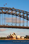 australia stock photography | Sydney Opera House and Harbour Bridge at Sunset, Sydney, New South Wales (NSW), Australia, Image ID AU-SYDNEY-OPERA-HOUSE-0010. The Sydney Harbour Bridge and The Sydney Opera House are Sydney's greatest icons and best-known landmark and international symbol. They are also are considered Australia's most distinctive urban structures. McMahon's Point provides amazing views of the Harbour Bridge and Opera House.