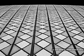 australia stock photography | Roof Tiles of Sydney Opera House, Sydney, NSW, Australia, Image ID AU-SYDNEY-OPERA-HOUSE-0019. Black and white close-up photo of the tiles of the beautiful and iconic Sydney Opera House in Sydney, NSW, Australia. These tiles were made in Sweden and one employee stayed in Denmark to sort the tiles that were sent to Sydney. Over 1 million of glossy tiles and matte tiles on the Opera House shells are set in a diagonal pattern rather than a straight checkerboard pattern.
