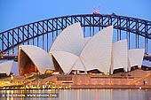 australia stock photography | Sydney Opera House and Harbour Bridge At Dusk, The Royal Botanic Garden, Sydney, NSW, Australia, Image ID AU-SYDNEY-OPERA-HOUSE-0028. Horizontal stock image of the Sydney Opera House and Harbour Bridge at dusk as it was seen from the Royal Botanic Garden in Sydney, NSW, Australia.