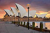 australia stock photography | Sydney Opera House at Sunrise, Sydney, NSW, Australia, Image ID AU-SYDNEY-OPERA-HOUSE-0034. Stock image of the Opera House in Sydney, NSW, Australia at sunrise right before the street lights were switched off.