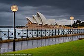 australia stock photography | Sydney Opera House on a Rainy Morning, Sydney, NSW, Australia, Image ID AU-SYDNEY-OPERA-HOUSE-0035. The Sydney Opera House on a cloudy and rainy morning with dramatic clouds above while city lights are still shining.