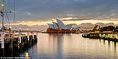 australia stock photography | Sydney Opera House at Sunrise, Sydney, NSW, Australia, Image ID AU-SYDNEY-OPERA-HOUSE-0046. Panoramic image of the Opera House in Sydney, NSW, Australia on a stormy morning from Overseas Passengers Terminal.