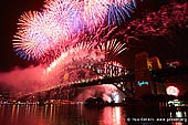 australia stock photography | Sydney's New Year Eve 2012 Fireworks over Harbour Bridge, Sydney, New South Wales (NSW), Australia, Image ID SYDNEY-NYE-FIREWORKS-0007. Sydney's famous harbour has played the perfect backdrop yet again to a stunning fireworks display that has welcomed in 2012.