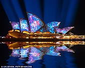 australia stock photography | Vivid Sydney 2014 - Lighting of the Sails, Sydney, NSW, Australia, Image ID VIVID-SYDNEY-2014-0001. This year, Vivid LIVE has commissioned award-winning international artists 59 Productions to create a new projected artwork for the sails of the Sydney Opera House, Vivid LIVE's most public event. Lauded for developing 'the most sophisticated use of film in the theatre to date' (Metro) and creating 'an entirely new art form' (The Guardian), 59 Productions will now take the iconic building on a dramatic journey through time - from the birth of architecture and civilization through to the pinnacle of human and technological achievement.